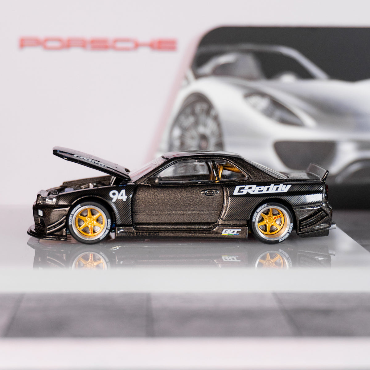 Nissan Skyline GT-R (R34) Kaido Works GReddy V2 – Black w/ Carbon
