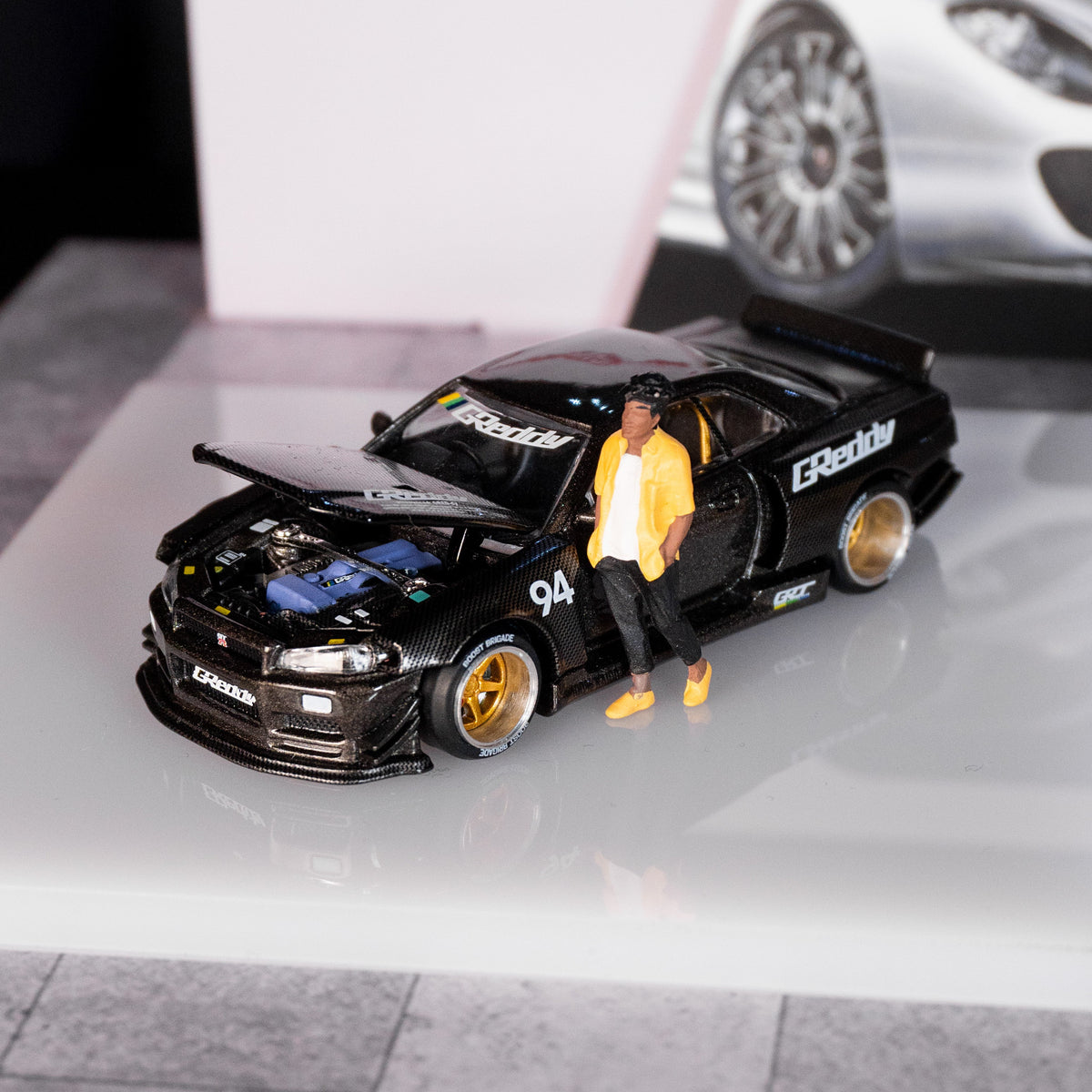 Nissan Skyline GT-R (R34) Kaido Works GReddy V2 – Black w/ Carbon