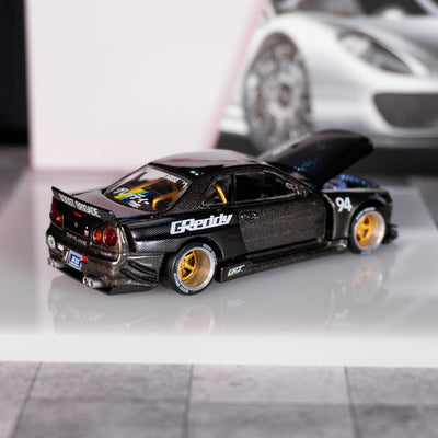 Nissan Skyline GT-R (R34) Kaido Works GReddy V2 – Black w/ Carbon